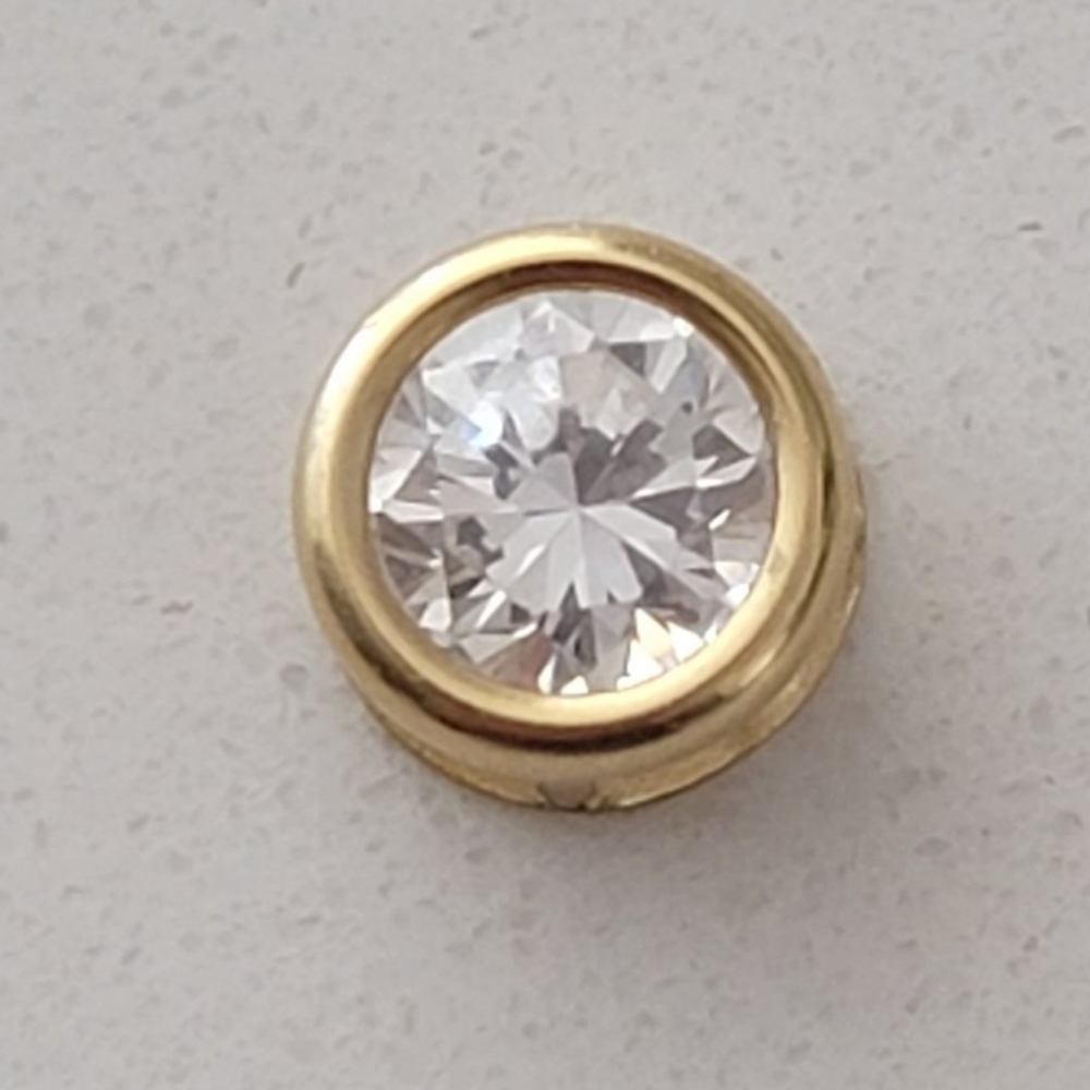 Diamonique tiny pendant set in 18kt gold